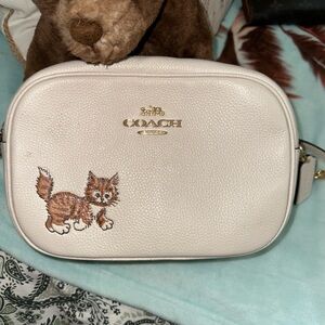Coach Cream Crossbody Bag with Playful Cat Design